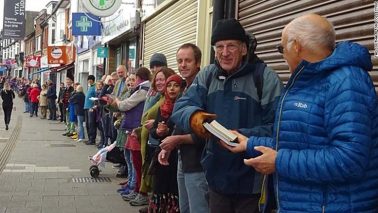 250 People Relocated an Entire Bookstore by Forming a Human Chain