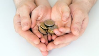 2 young men step in to help a woman pay for her gas